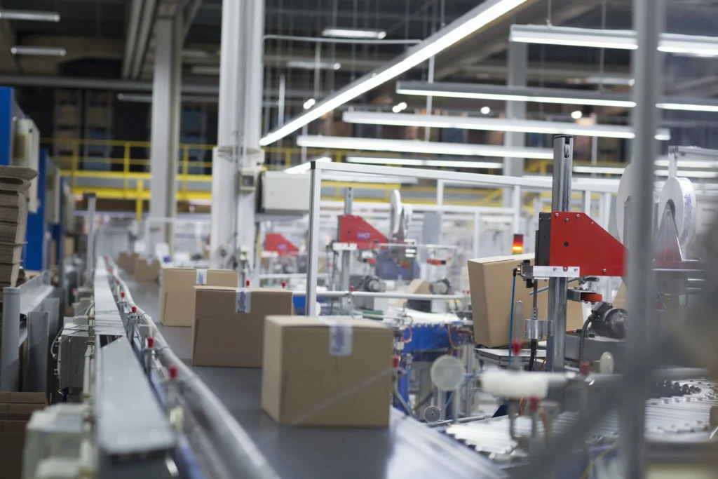 boxes-on-production-line-at-paper-packaging-factor-2024-10-19-21-48-26-utc